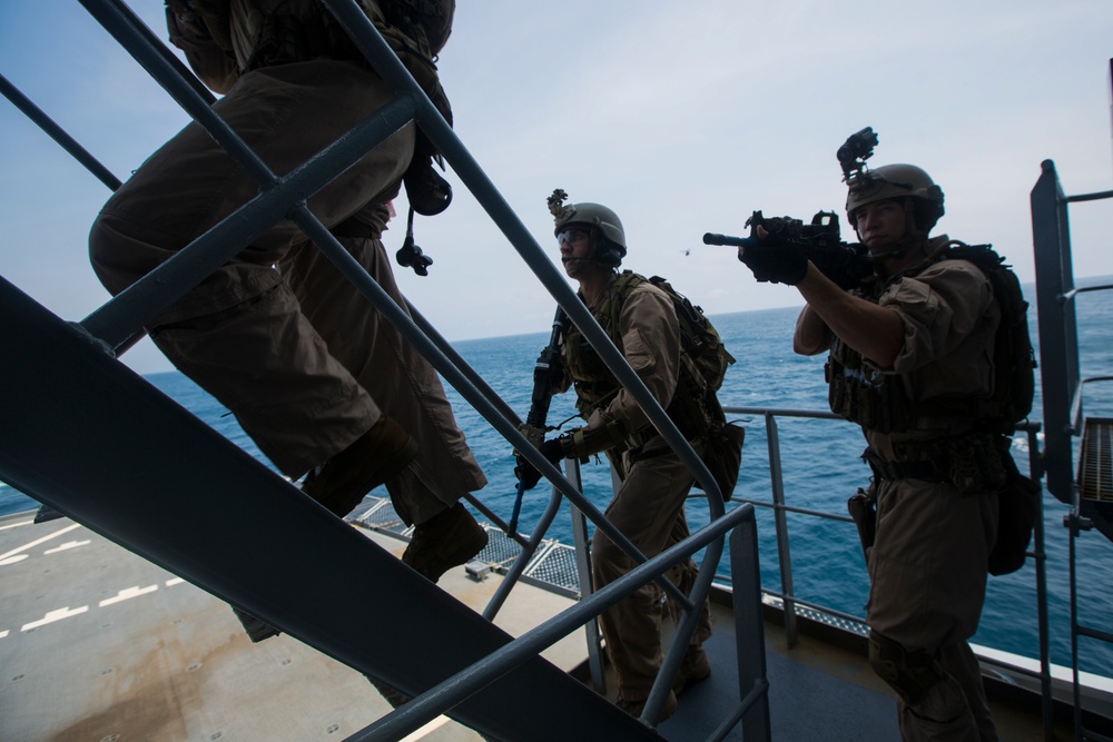 Force Recon Marines practice taking over ships at sea