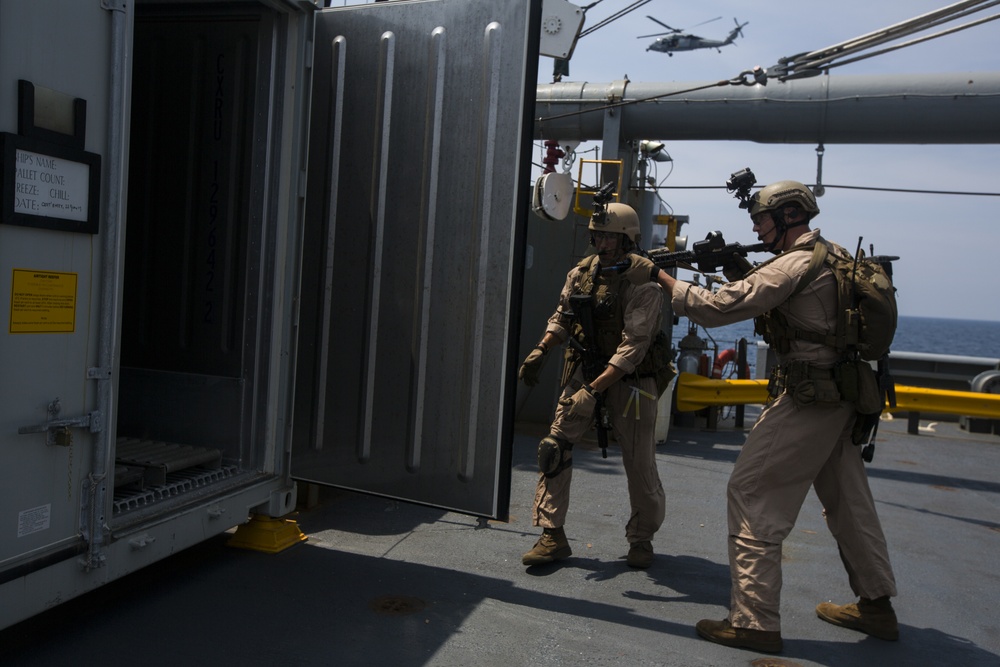 Force Recon Marines practice taking over ships at sea