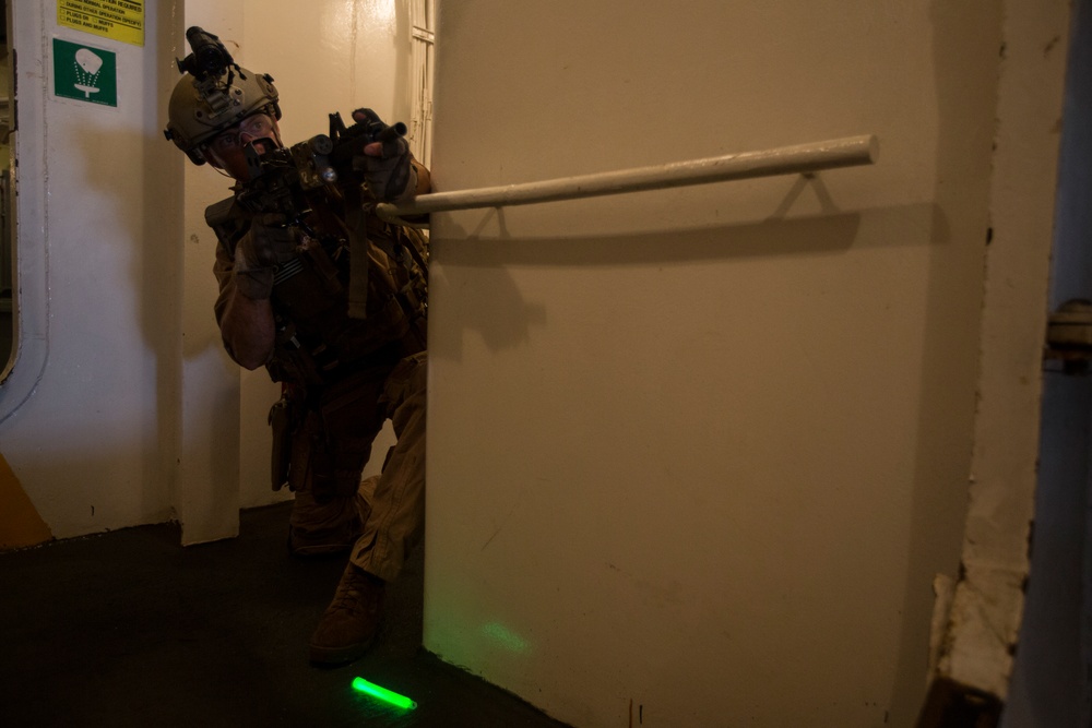 Force Recon Marines practice taking over ships at sea