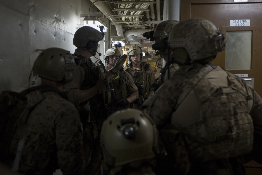 Force Recon Marines practice taking over ships at sea