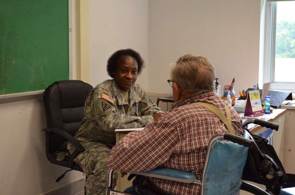 Service member provides a medical consultation during the IRT mission in Norwich, NY