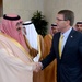 Secretary of defense shakes hand with king of Saudi Arabia