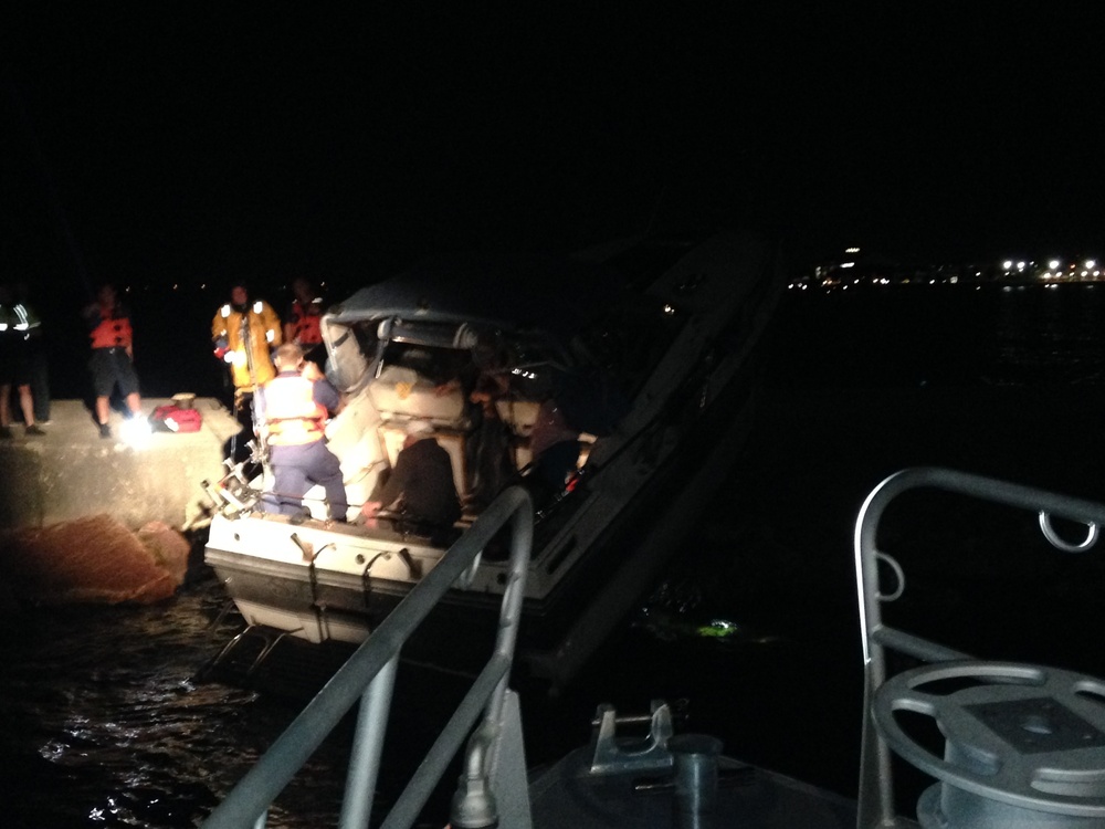Coast Guard, local agencies rescue 3 from vessel on Sheboygan breakwall