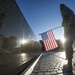 Soldier at the Vietnam Memorial wall