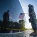 Soldier reflects at Vietnam Memorial wall