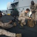 U.S. Marines perform radio checks at sea