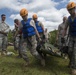 Soldiers hoist floating litters