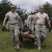 Soldiers hoist floating litters