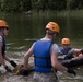 Soldiers hoist floating litters