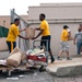Lincoln Sailors work together with Operation Homefront in their yearly Backpack Brigade