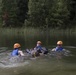 Soliders hoist floating litters