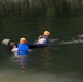 Soldiers hoist floating litters