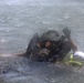 Soldiers hoist floating litters