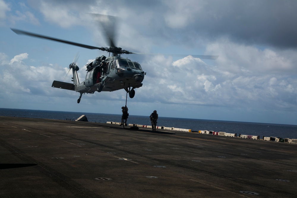 U.S. Marines practice ship boarding at sea