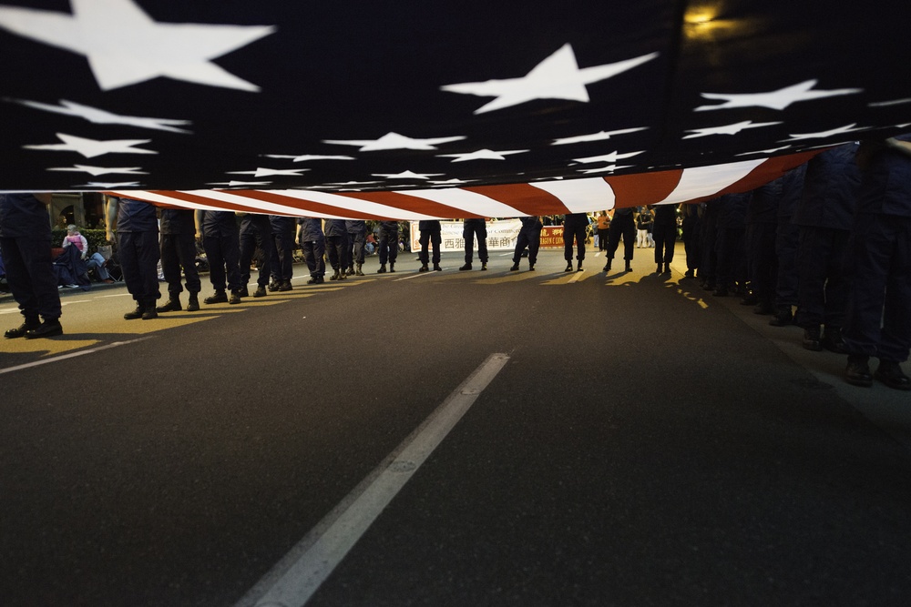 Photo Release: Pacific Northwest Coast Guardsmen participate in 66th Annual Torchlight Parade