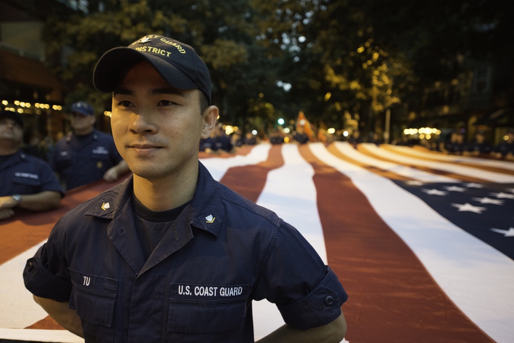 Photo Release: Pacific Northwest Coast Guardsmen participate in 66th Annual Torchlight Parade
