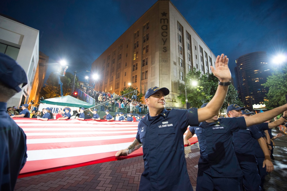 Photo Release: Pacific Northwest Coast Guardsmen participate in 66th Annual Torchlight Parade