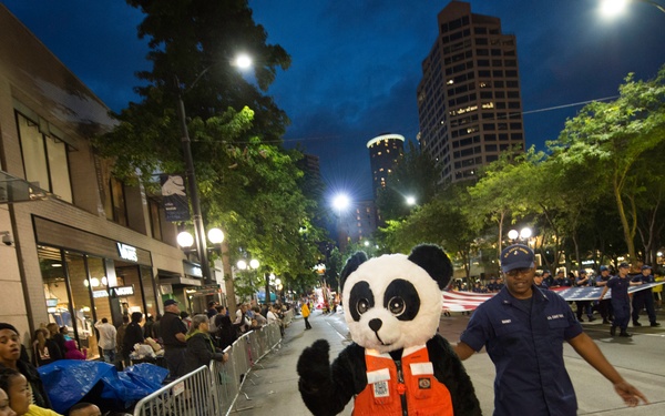 Photo Release: Pacific Northwest Coast Guardsmen participate in 66th Annual Torchlight Parade