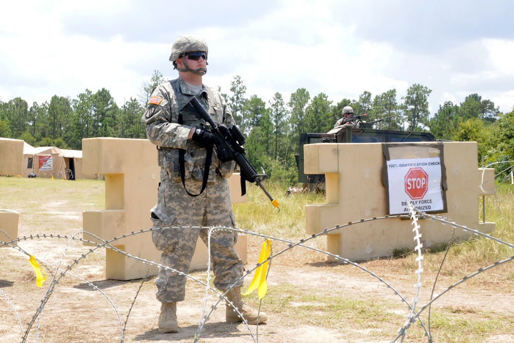 Soldiers guard squadron command post during XCTC