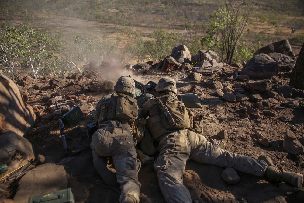 Snipers, machine gunners provide support during training