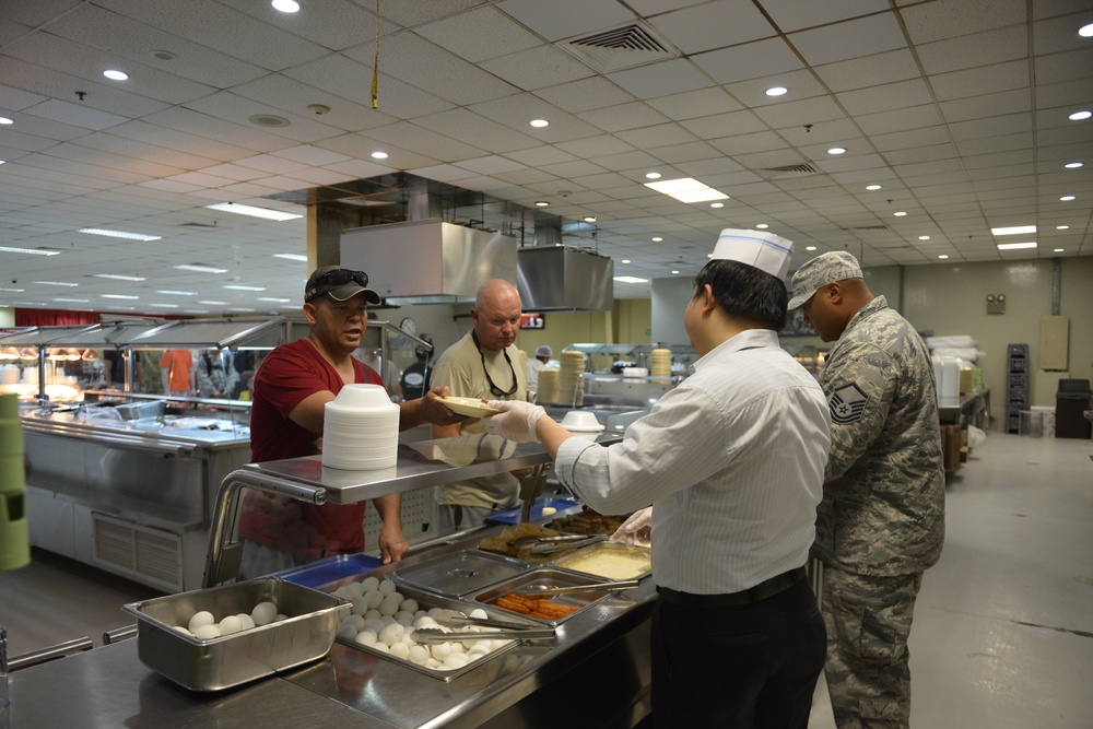 Service with a smile: DFAC cooks love their job