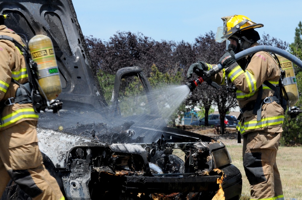 Kingsley Field Fire Department responds to a burning car during a training exercise