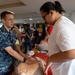 Mercy Sailors teach a Basic Life Support class in Roxas City, Philippines during Pacific Partnership 2015.