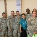 National Guard Liaison Monitoring Team visits local school, volunteers with young adult education program