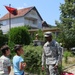 National Guard Liaison Monitoring Team visits local school, volunteers with young adult education program