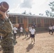 U.S. Marines with SPMAGTF-SC attend the 56th Anniversary Celebration of C.E.B. Ramon Rosa in Puerto Lempira, Honduras