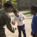 U.S. Marines with SPMAGTF-SC attend the 56th Anniversary Celebration of C.E.B. Ramon Rosa in Puerto Lempira, Honduras