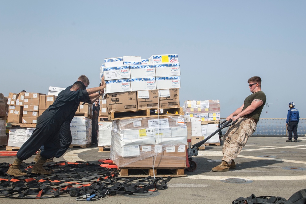 U.S. Marines pitch in for replenishment-at-sea