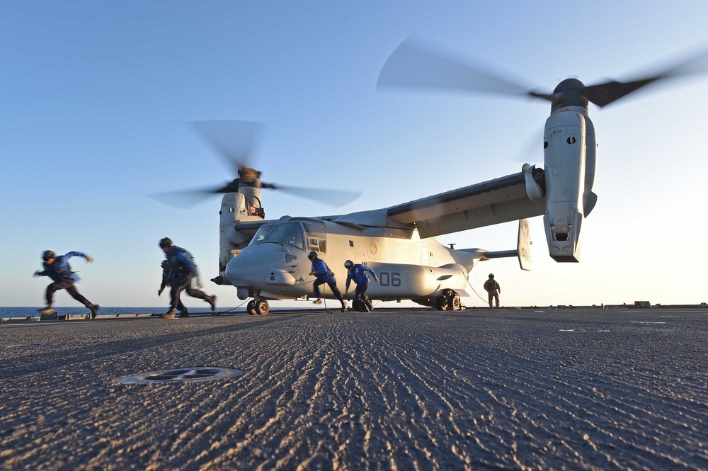 Chock and chaining an MV-22 Osprey tiltrotor aircraft