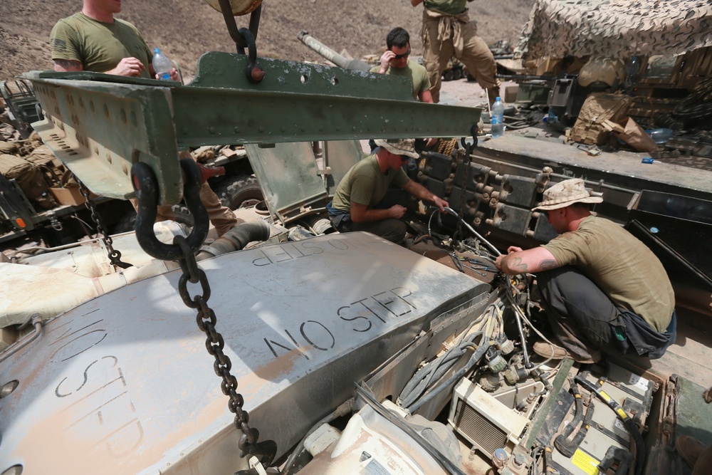 U.S. Marines repair M1A1 Abrams tanks