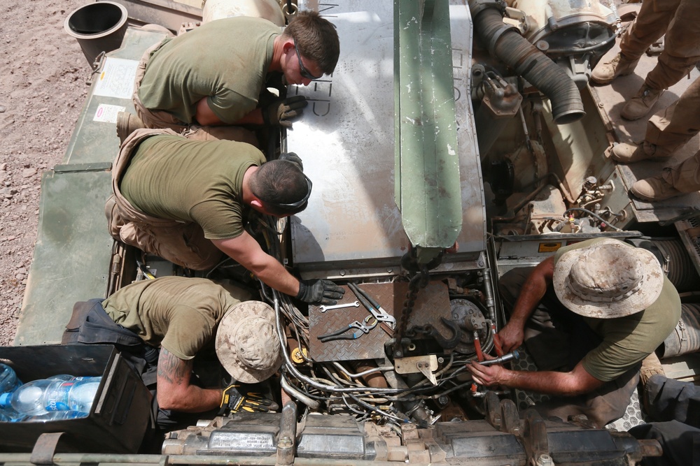 U.S. Marines repair M1A1 Abrams tanks