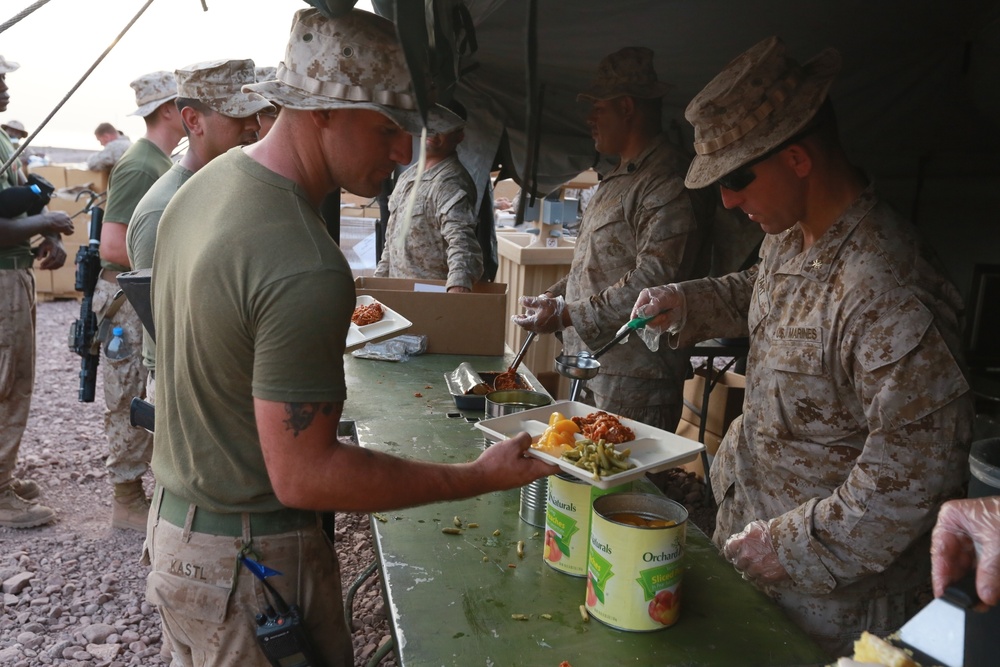 U.S. Marines enjoy a hot meal