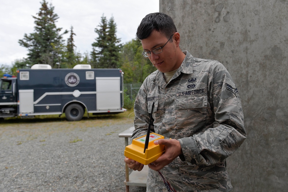 Arctic explosive ordnance technicians conduct controlled detonations