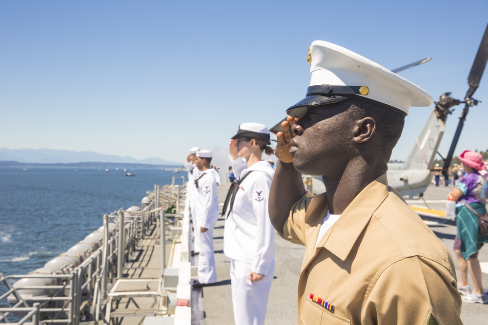 Marines, Sailors aboard USS Boxer ‘man the rails’ during the Parade of Ships