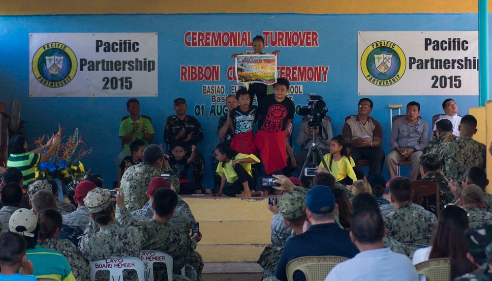 Ribbon cutting ceremony at Basiao Elementary School in the Philippines during Pacific Partnership 2015