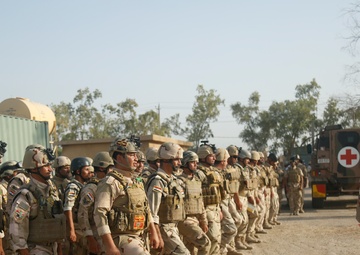 ISF receive combat lifesaver techniques, weapon familiarization