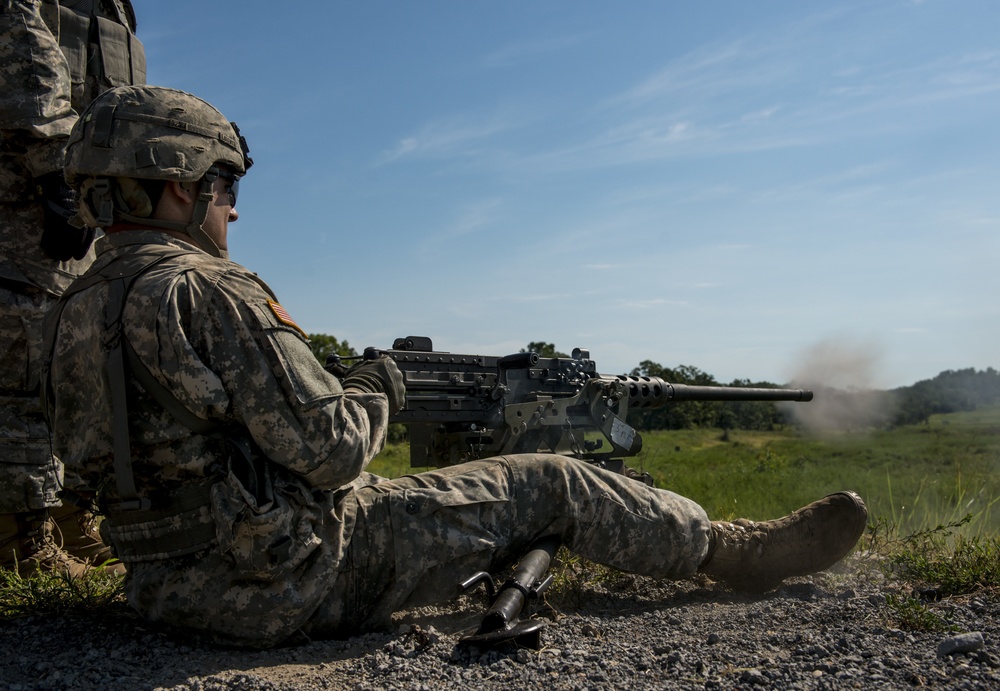 Soldier firing the .50-cal machine gun.