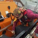 Boatswains mate maintains equipment aboard Millinocket