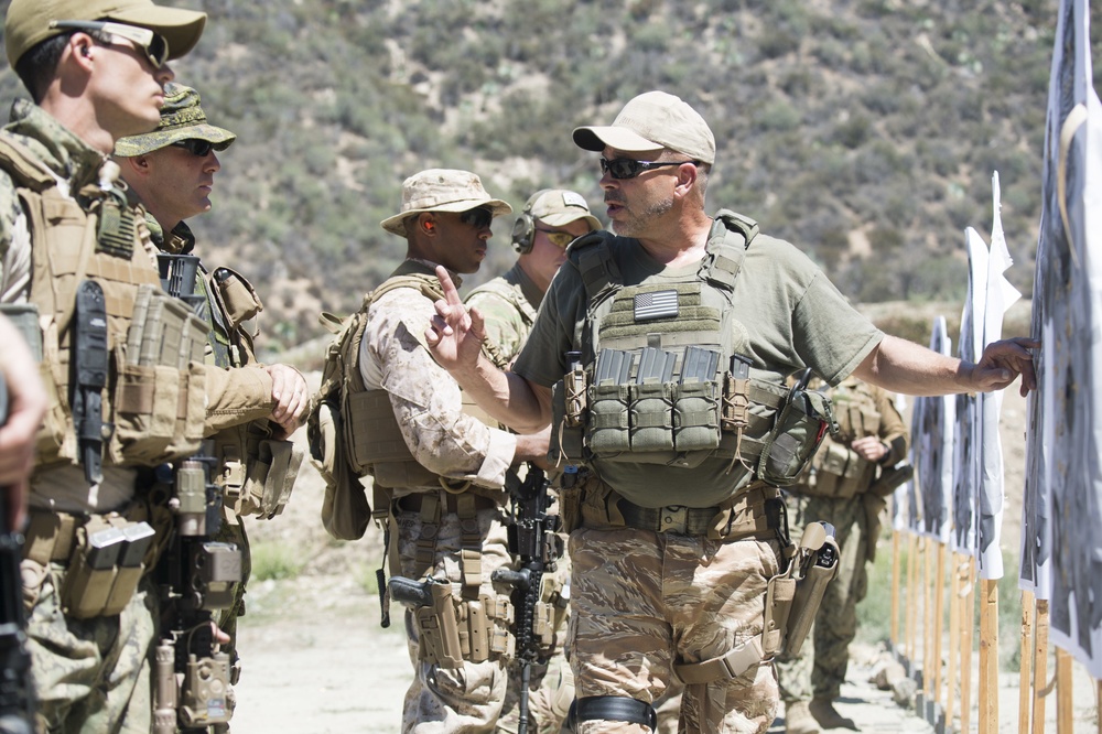 US and Canadian military combat cameramen train in combat tactics