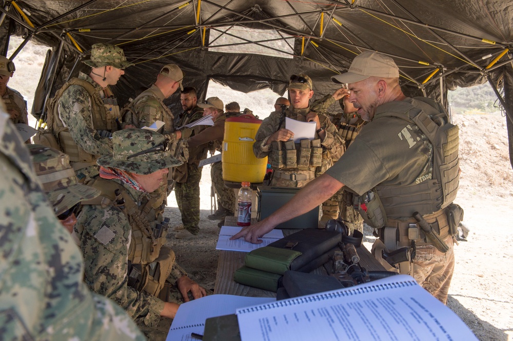 US and Canadian military combat cameramen train in combat tactics