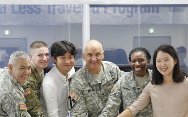 Soldiers and students celebrate the end of KLT Program