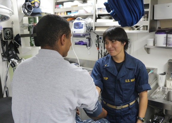 Measuring blood pressure aboard USS Higgins