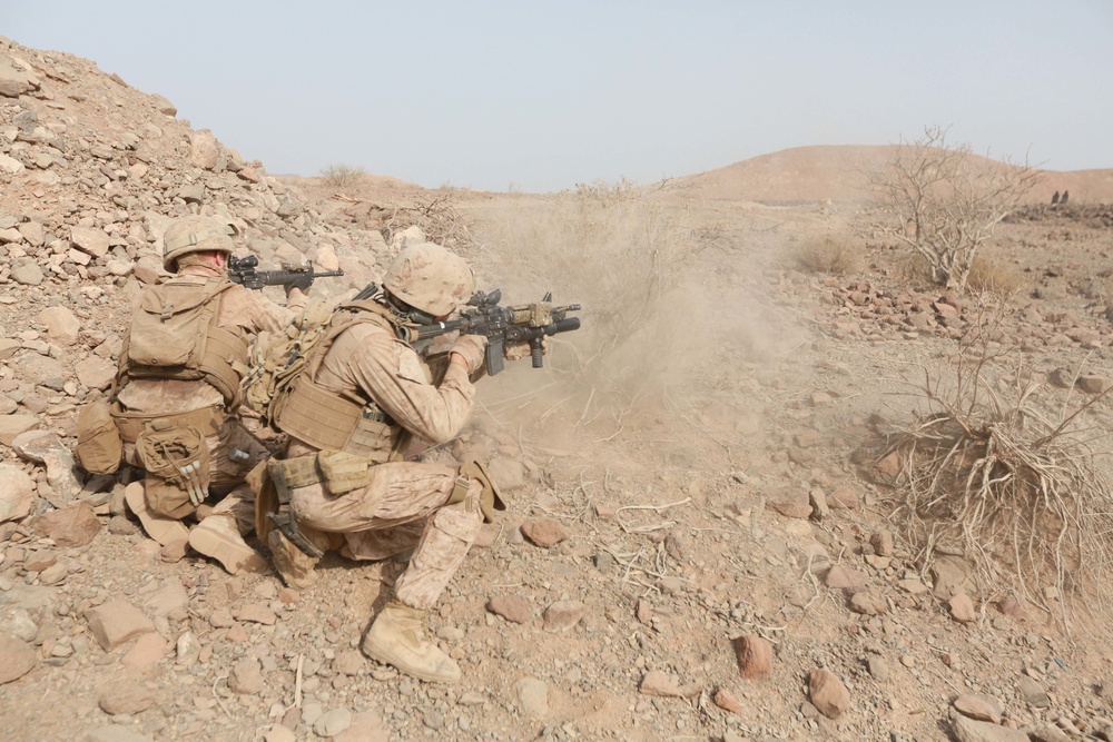 U.S. Marines practice fire and maneuver