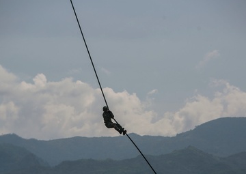 U.S. and Philippine Marines fast rope from Ospreys