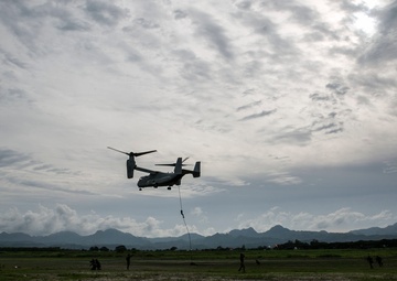 U.S. and Philippine Marines fast rope from Ospreys