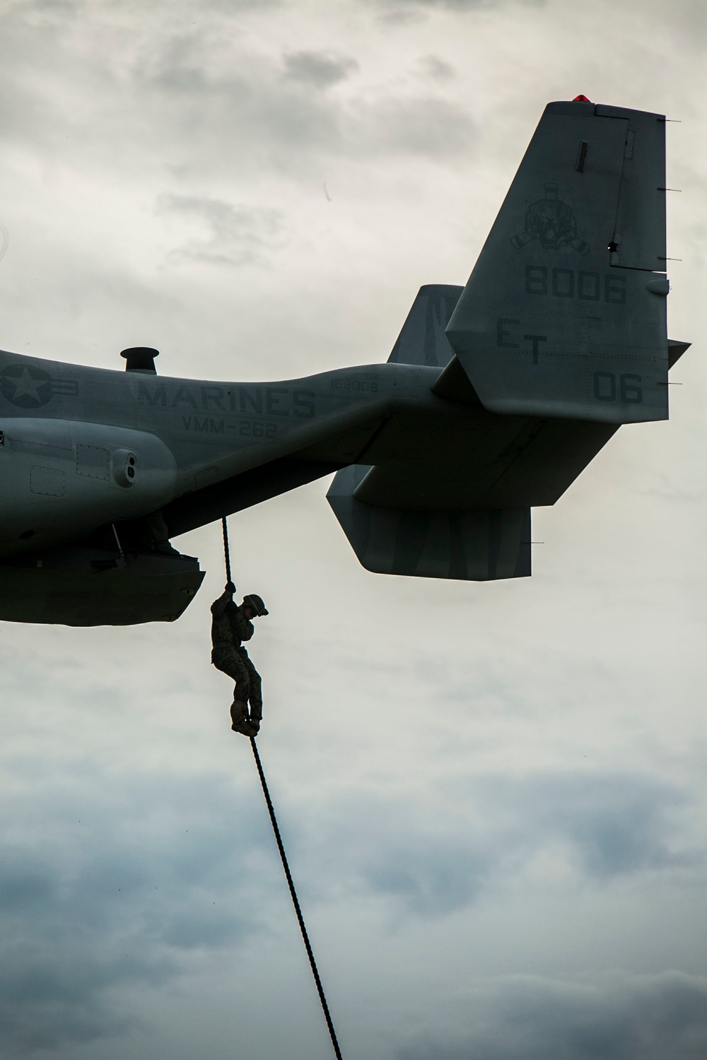 U.S. and Philippine Marines fast rope from Ospreys